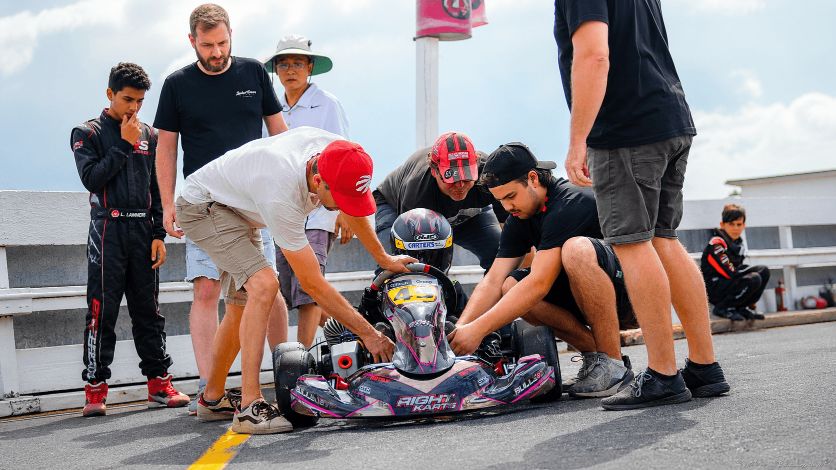 Parent and junior driver at a KartSport Auckland club day